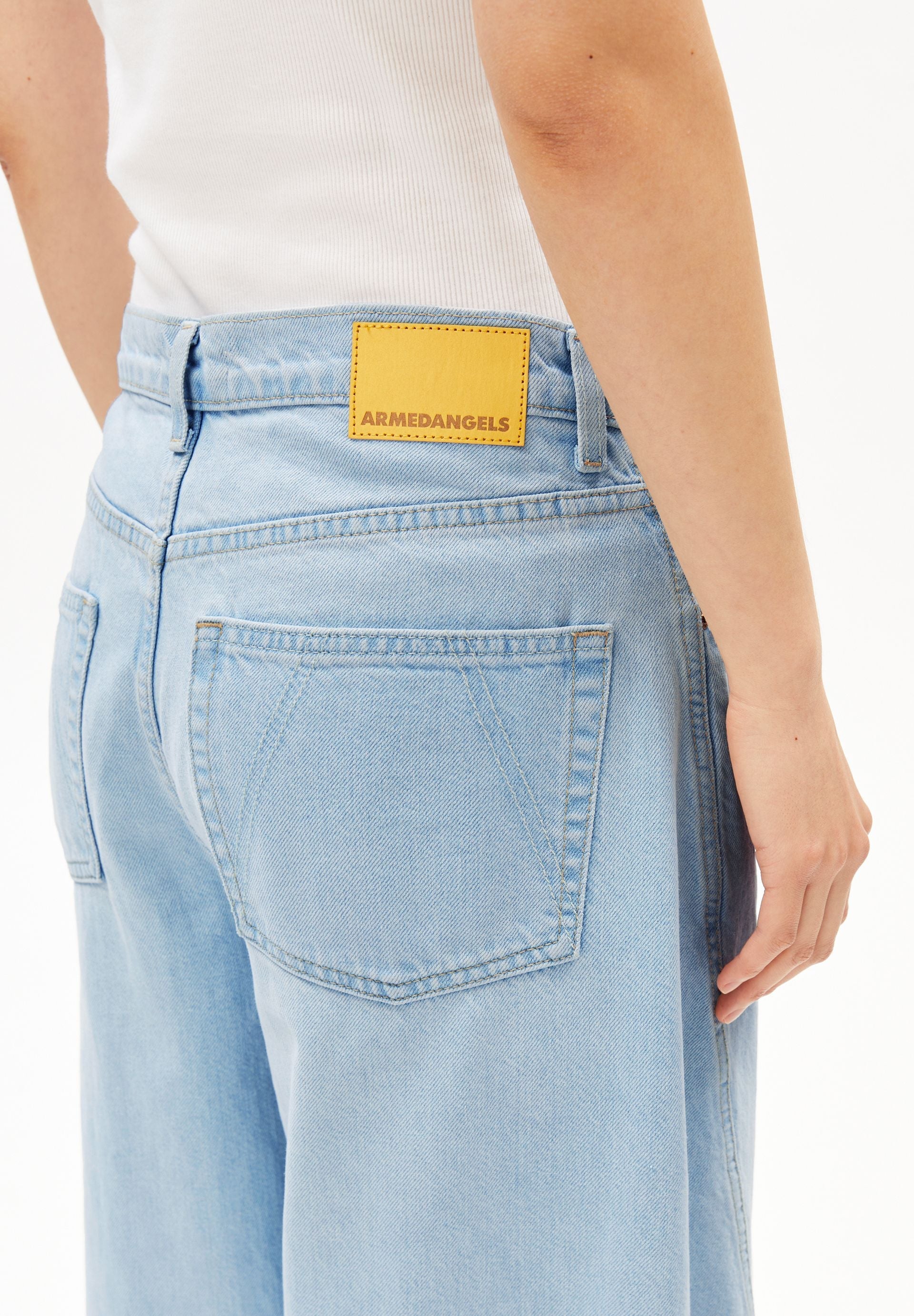 AALTHEA mid waist barrel jeans by ARMEDANGELS, featuring a five pocket design and a stylish denim finish.