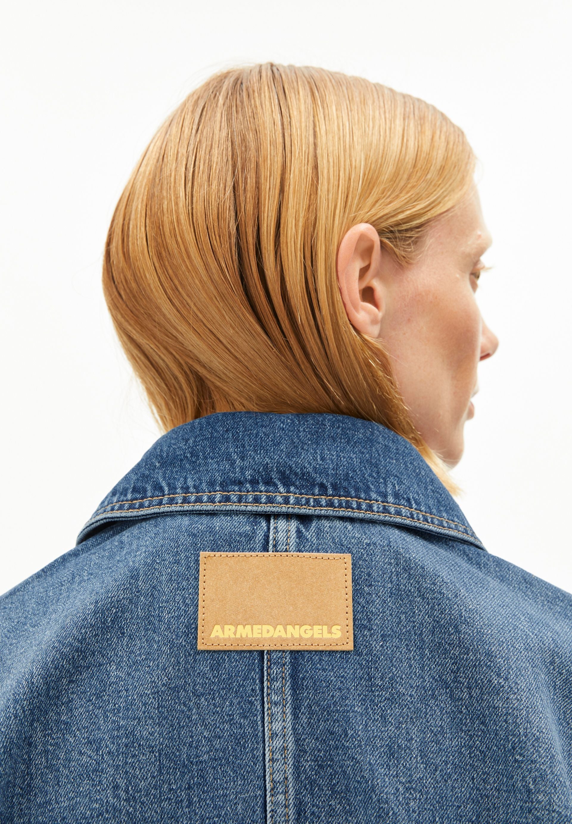 ARMEDANGELS DRAAPY faded denim jacket displayed on a mannequin, showcasing its casual style and unique wash.