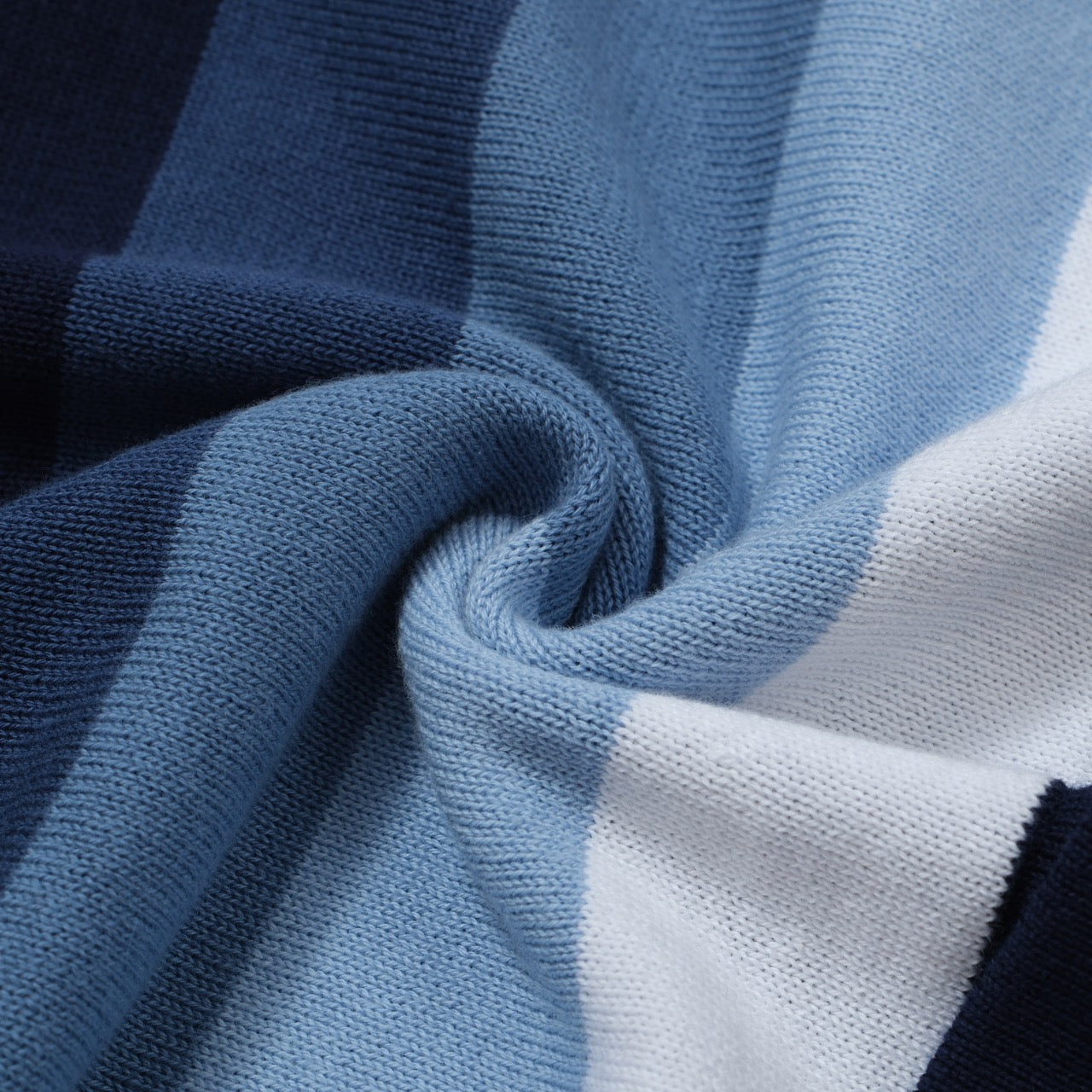 Men's OXKNIT navy and sky blue vertical stripe knit polo shirt with button-up design, showcasing retro 60s style.