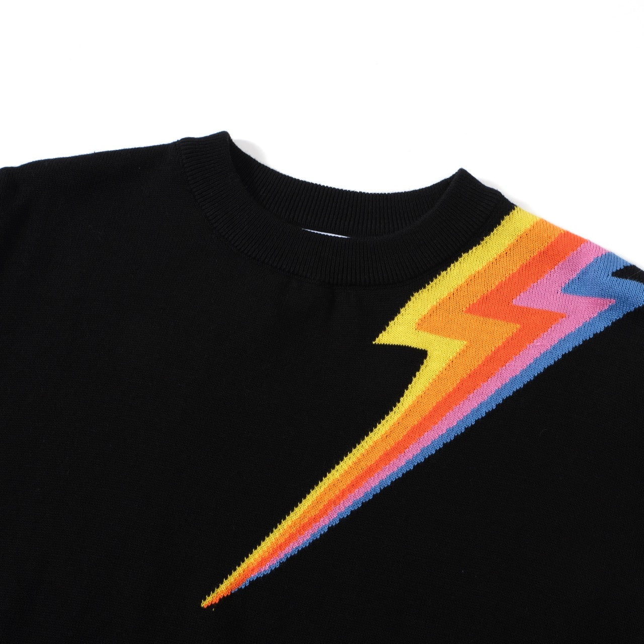 Women's black sweater with a lightning bolt design, featuring a retro 60s MOD style by OXKNIT, long sleeves and knit fabric.