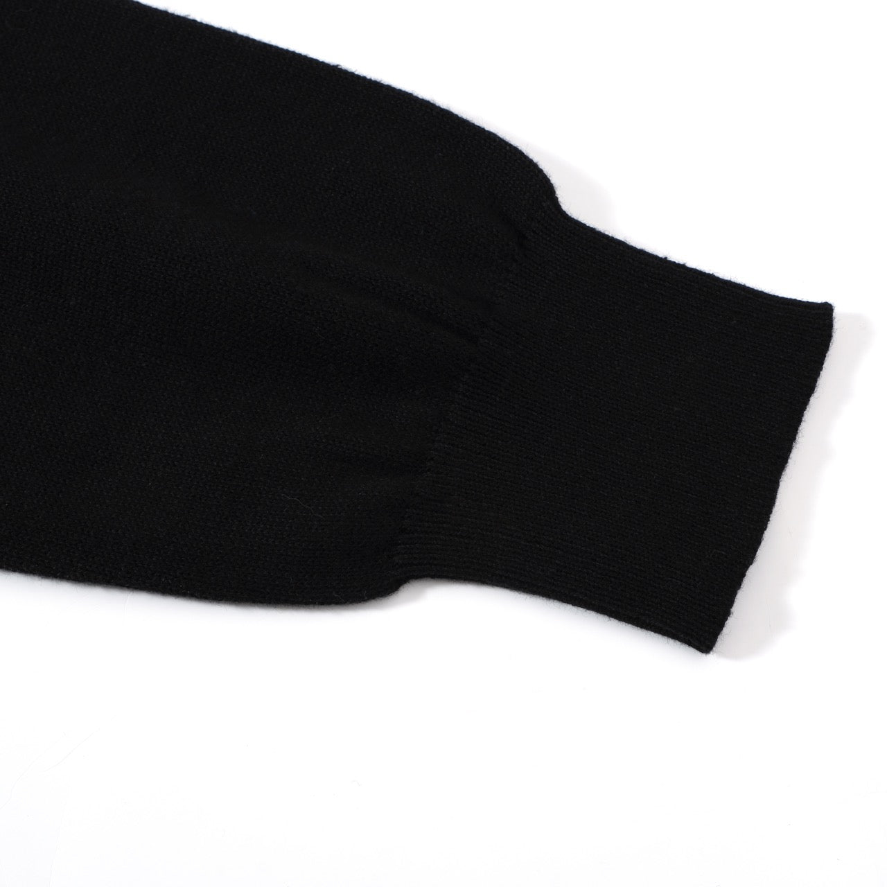 Women's black lightning bolt sweater by OXKNIT, featuring retro 60s MOD style and casual long sleeves.